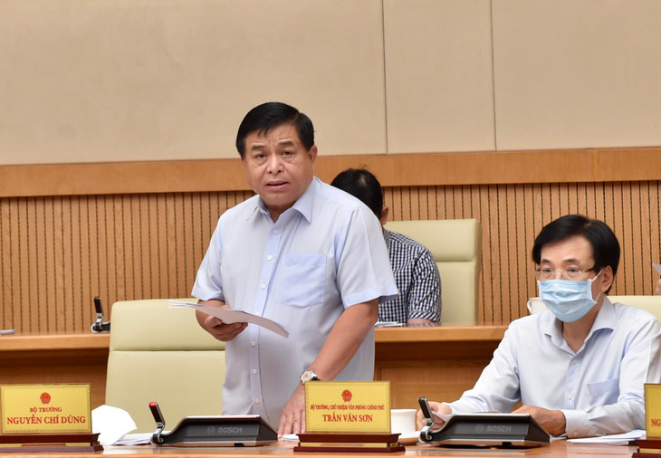 Bộ trưởng Bộ Kế hoạch và Đầu tư Nguyễn Chí Dũng báo cáo tóm tắt về tình hình triển khai thực hiện Luật Quy hoạch. Ảnh: VGP