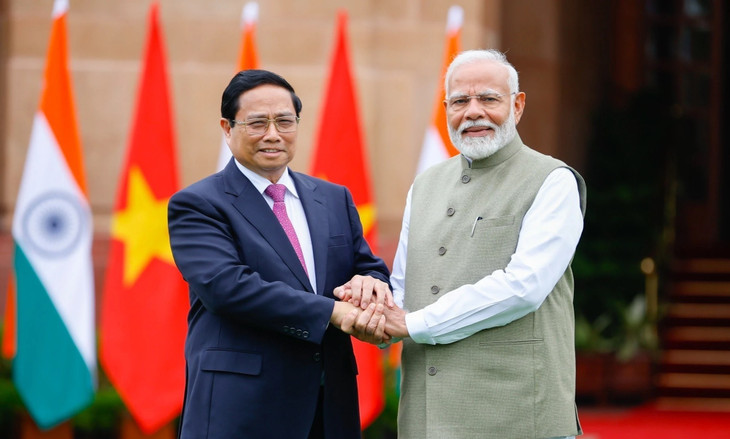 Thủ tướng Phạm Minh Chính và Thủ tướng Ấn Độ Narendra Modi. Ảnh: TTXVN