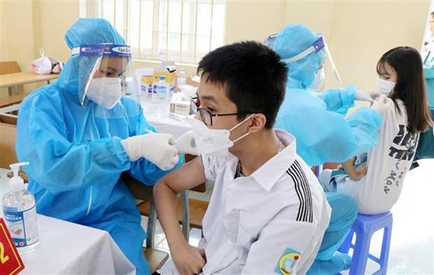 Chủ tịch UBND TP. Hà Nội Trần Sỹ Thanh vừa ký công điện về tăng cường tiêm vaccine Covid-19. Ảnh: TTXVN