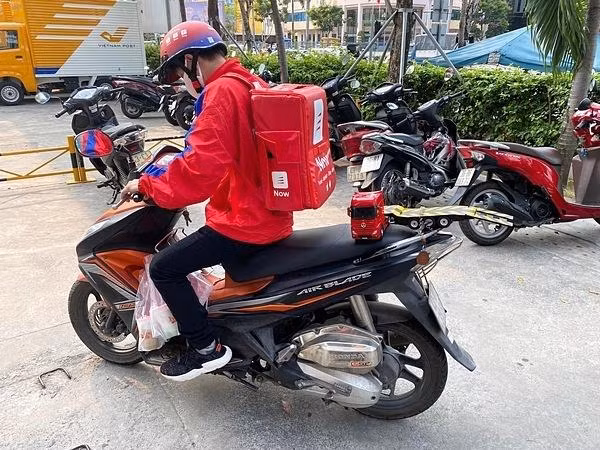 Now là ứng dụng đầu tiên trở lại hoạt động giao hàng và đi chợ hộ tại Hà Nội