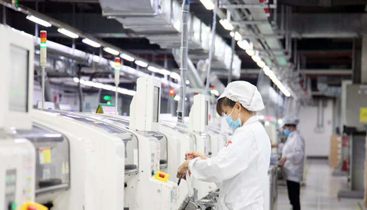 Công nhân sản xuất trong khu công nghiệp ở tỉnh Bắc Giang Công nhân sản xuất trong khu công nghiệp ở tỉnh Bắc Giang