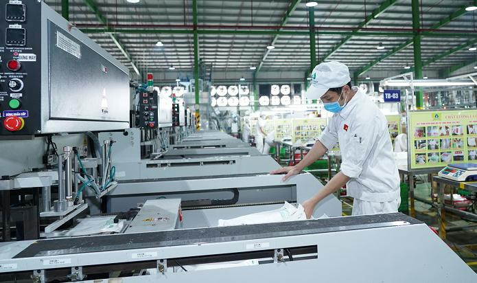 Nền kinh tế Việt Nam có khả năng phục hồi nhanh hơn; hoạt động sản xuất, kinh doanh tiếp tục khởi sắc. Ảnh: Thế Hải