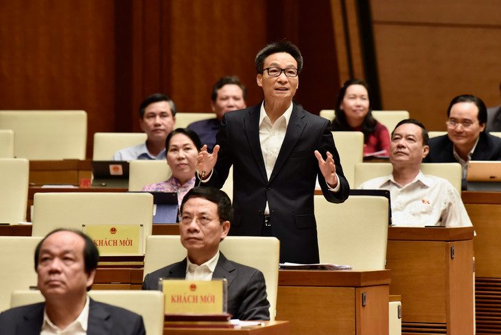 Phó Thủ tướng và các Bộ trưởng trả lời chất vấn ảnh 1