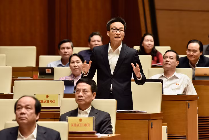 Phó Thủ tướng và các Bộ trưởng trả lời chất vấn ảnh 1