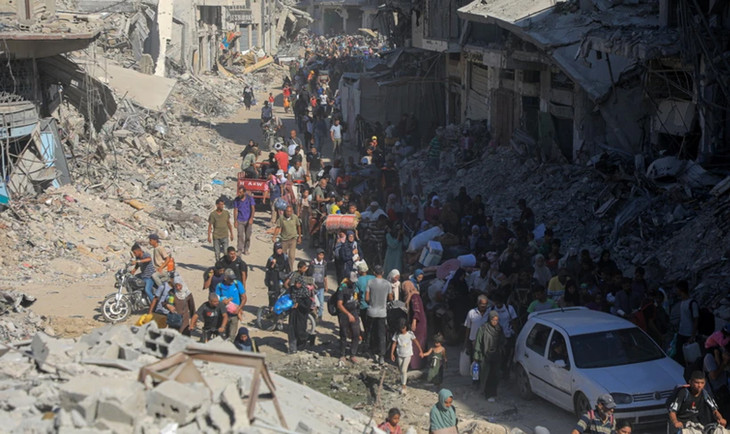 Người dân sơ tán khỏi thành phố Khan Younis, miền Nam Dải Gaza ngày 8/8 vừa qua. Ảnh: THX/TTXVN Người dân sơ tán khỏi thành phố Khan Younis, miền Nam Dải Gaza ngày 8/8 vừa qua. Ảnh: THX/TTXVN