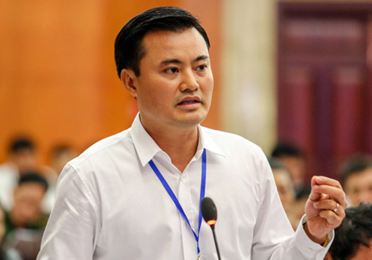 Ông Bùi Xuân Cường khi làm Giám đốc Sở Giao thông vận tải trả lời chất vấn, tháng 12/2018