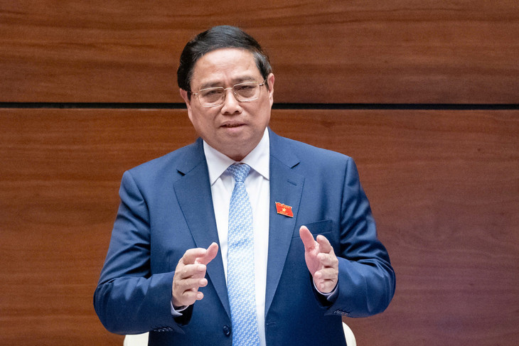 Thủ tướng Chính phủ Phạm Minh Chính báo cáo làm rõ các vấn đề liên quan và trả lời chất vấn của đại biểu Quốc hội