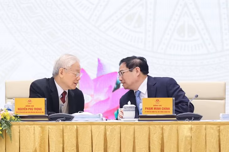 Tổng Bí thư Nguyễn Phú Trọng trao đổi với Thủ tướng Phạm Minh Chính tại Hội nghị Chính phủ với địa phương vào tháng 1/2022 - Ảnh VGP
