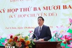 Tân Chủ tịch UBND tỉnh Lai Châu, đồng chí Hà Quang Trung phát biểu nhận nhiệm vụ. *Ảnh: Quý Trung/TTXVN)