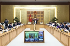 Thủ tướng Chính phủ Phạm Minh Chính chủ trì họp với các bộ, ngành, cơ quan Trung ương, trực tuyến với các địa phương về tình hình thực hiện "Chiến dịch Quang Trung" - Ảnh: VGP/Nhật Bắc