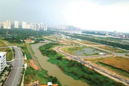 Nhiều nhà đầu tư dự án BT trong Khu đô thị mới Thủ Thiêm đã được tháo gỡ vướng mắc trong việc xác định giá đất đối với diện tích đất thanh toán cho hợp đồng BT để thực hiện dự án đối ứng. Ảnh: Song Lê