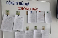 Niêm yết việc đấu giá tài sản là quy trình bắt buộc khi tổ chức hành nghề đấu giá tài sản thực hiện bán đấu giá. Ảnh: Ngọc Trí