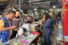 Cơ quan thuế sẽ triển khai đợt cao điểm 15 ngày hỗ trợ hộ kinh doanh đăng ký, kê khai và nộp thuế theo quy định mới. Ảnh: Tiên Giang