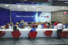 Các ngân hàng đẩy mạnh tăng vốn điều lệ nhằm củng cố hệ số an toàn vốn và mở rộng hạn mức tín dụng. Ảnh: Lê Tiên