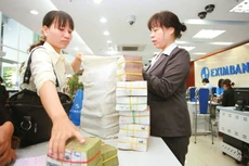 Mặt bằng lãi suất tiền gửi tiết kiệm cá nhân tại các ngân hàng tiếp tục ổn định. Ảnh: Song Lê