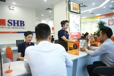 Mô hình tăng trưởng dựa chủ yếu vào mở rộng tín dụng đang tiệm cận giới hạn an toàn. Ảnh: Tiên Giang