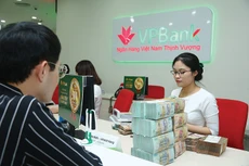 Trong tháng 9, lãi suất cho vay bình quân đối với các giao dịch phát sinh mới của các ngân hàng thương mại ở mức 6,52%/năm, giảm 0,41%/năm so với cuối năm 2024. Ảnh: Lê Tiên