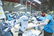 Ngành dệt may đang đối mặt với nhiều thách thức từ thuế quan, cạnh tranh, gián đoạn chuỗi cung ứng. Ảnh: Lê Tiên