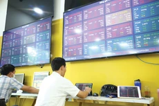 Việc thị trường chứng khoán Việt Nam được nâng hạng giúp nhiều doanh nghiệp có thêm kênh huy động vốn hiệu quả với chi phí thấp. Ảnh: Tiên Giang