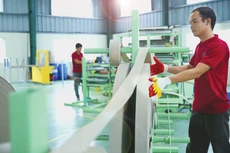 Chính sách miễn, giảm, giãn thuế, phí, tiền thuê đất trong giai đoạn 2020 - 2025 góp phần quan trọng giúp doanh nghiệp phục hồi sản xuất, kinh doanh và vượt qua thời kỳ khó khăn. Ảnh: Quốc Ân