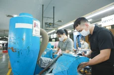 Doanh nghiệp Việt, nhất là doanh nghiệp nhỏ và vừa còn nhiều hạn chế về vốn, năng lực công nghệ, khả năng tiếp cận thị trường. Ảnh: Tiên Giang