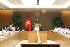 Phó Thủ tướng Nguyễn Hòa Bình chủ trì cuộc họp về tình hình xây dựng các dự thảo nghị định hướng dẫn Nghị quyết số 222/2025/QH15 về Trung tâm tài chính quốc tế tại Việt Nam. Ảnh: Nguyễn Hoàng