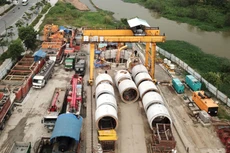 Các ban quản lý dự án cấp quận/huyện tại TP.HCM vẫn đang thực hiện vai trò triển khai hoạt động đầu tư, đấu thầu. Ảnh: Song Lê