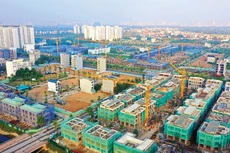 Bộ Xây dựng đề xuất rút ngắn thời gian cấp phép xuống còn 10 ngày làm việc đối với trường hợp cấp giấy phép xây dựng công trình, 7 ngày làm việc đối với nhà ở riêng lẻ (giảm 50% so với quy định cũ). Ảnh: Lê Tiên