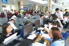 Dự án Luật Quản lý thuế (thay thế) được nghiên cứu và thiết kế với nhiều chính sách quan trọng, tập trung vào định hướng về cắt giảm, đơn giản hóa thủ tục hành chính. Ảnh: Hoàng Hà