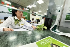 Đến cuối tháng 11/2025, tổng tài sản của hệ thống các tổ chức tín dụng đạt 27.058,28 nghìn tỷ đồng, tăng 18% so với cuối năm 2024. Ảnh: Nhã Chi