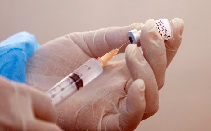 Bộ Y tế chịu trách nhiệm tiếp nhận viện trợ, mua và tổ chức tiêm chủng vaccine phòng Covid-19 cho trẻ em từ 5 đến dưới 12 tuổi