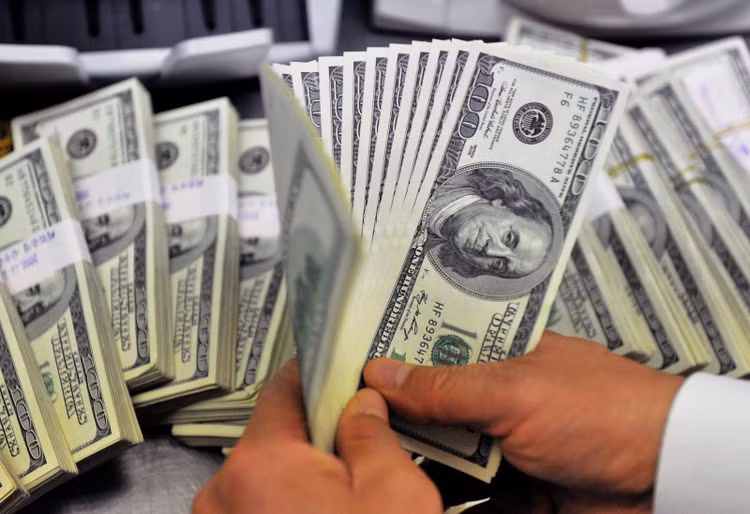 Tỷ giá trung tâm sáng ngày 27/5 ở mức 23.109 VND/USD, tăng 4 đồng so với hôm qua. Ảnh minh họa: TTXVN