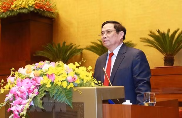 Trưởng Ban Tổ chức Trung ương Phạm Minh Chính giới thiệu, quán triệt chuyên đề: “Báo cáo tổng kết công tác xây dựng Đảng và thi hành Điều lệ Đảng của Ban Chấp hành Trung ương khóa XII tại Đại hội XIII của Đảng.” Ảnh: TTXVN
