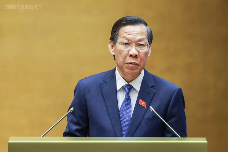 Chủ nhiệm Ủy ban Kinh tế và Tài chính của Quốc hội Phan Văn Mãi trình bày Báo cáo thẩm tra - Ảnh: chinhphu.vn/Nhật Bắc