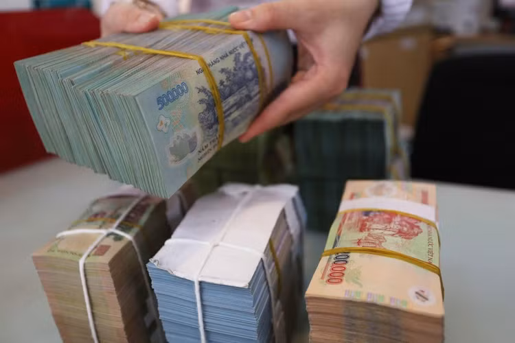 Luật về xử lý nợ xấu cần quy định rõ việc phối hợp giữa các bên có liên quan trong quá trình xử lý nợ xấu. Ảnh: Minh Dũng