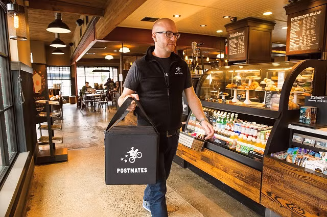 Uber thâu tóm startup giao đồ ăn Postmates