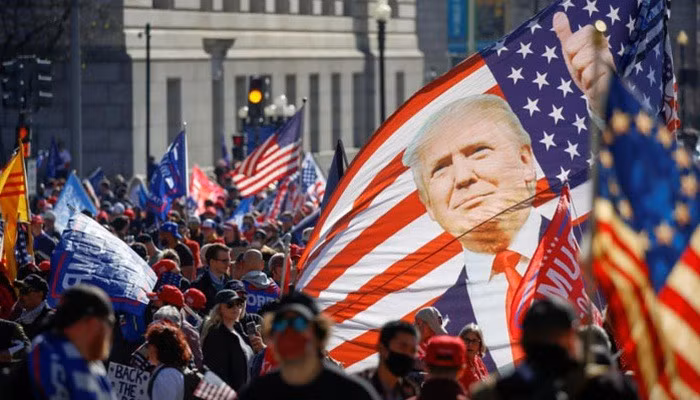 Người ủng hộ Tổng thống Mỹ Donald Trump xuống đường ở Washington ngày 14/11 - Ảnh: Reuters. 