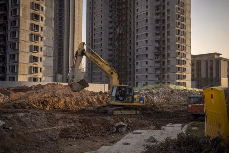 Một dự án của Evergrande ở Vũ Hán, Trung Quốc, hôm 22/12 - Ảnh: Bloomberg.